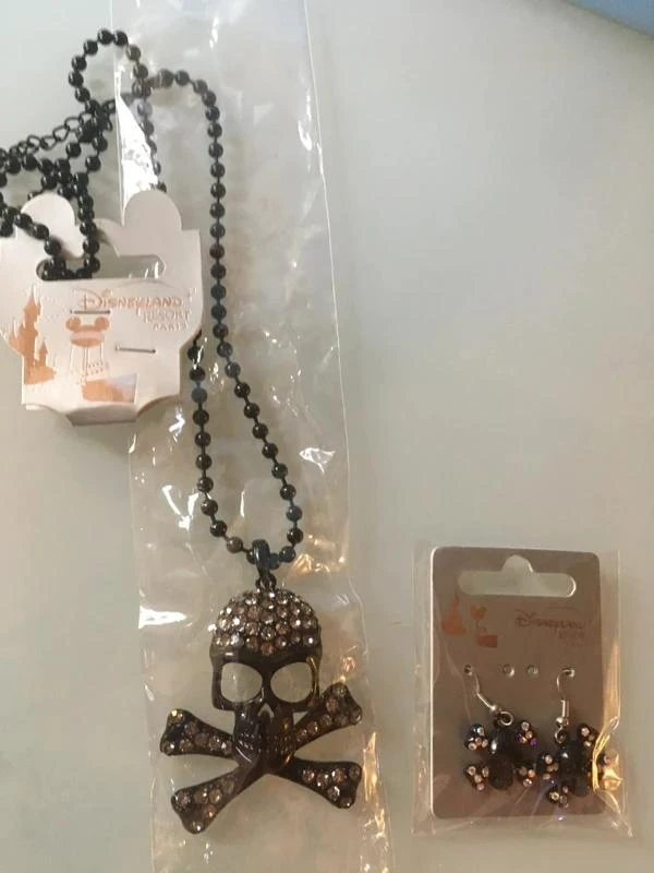 Ensemble collier + boucles oreilles strass tête de mort /pirate disney disneylan